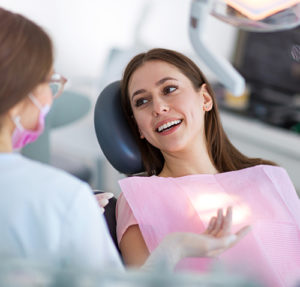 woman in dentists chair ready for sedation dentistry services