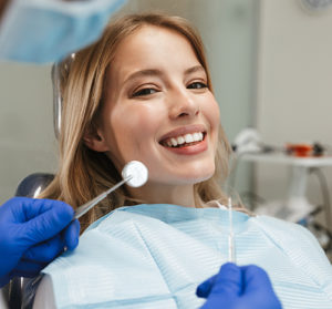 woman submits new dental patient information